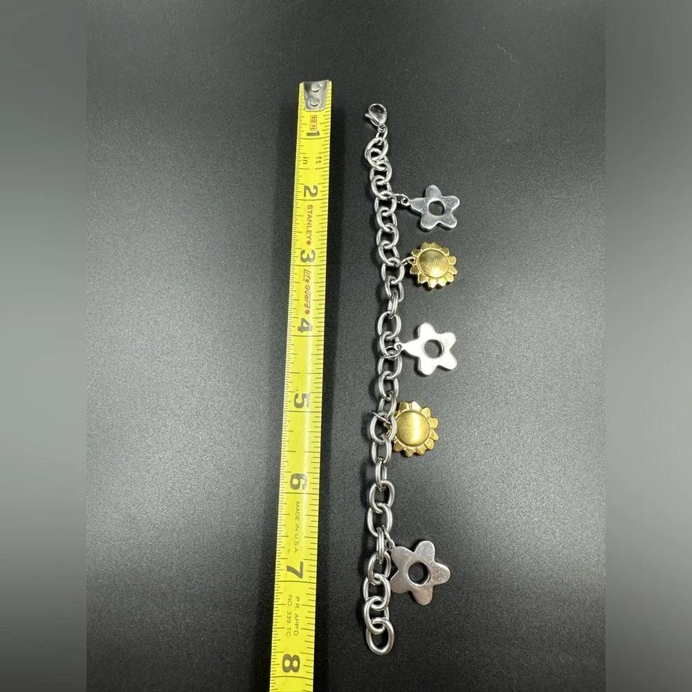 Two Tone Stainless Steel Star and Sun Charm Bracelet